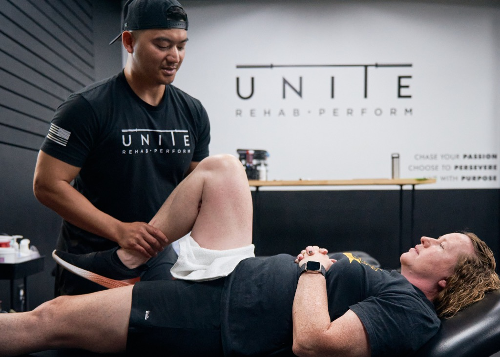 Woman receiving physiotherapy treatment for running